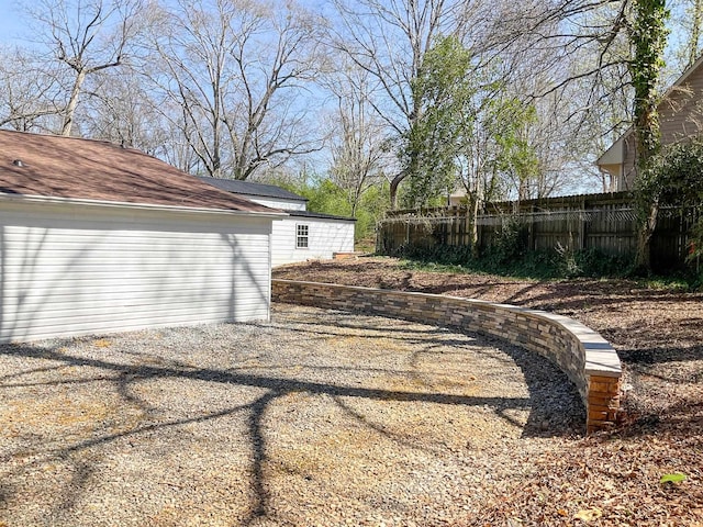 view of yard with fence