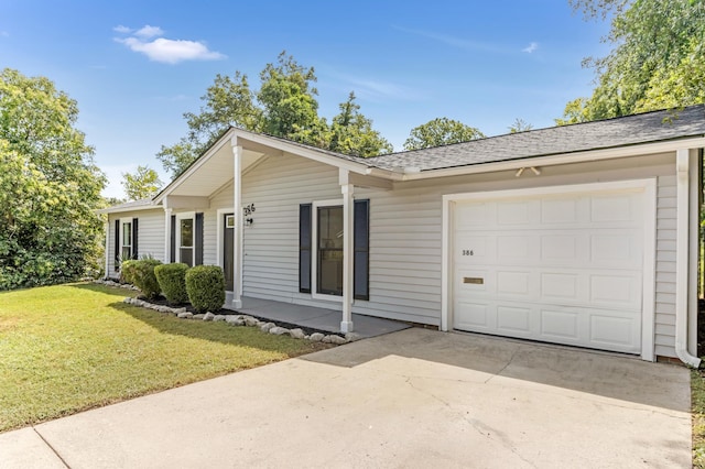 single story home featuring an attached garage, a shingled roof, driveway, and a front yard