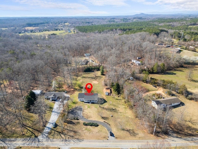 drone / aerial view with a forest view