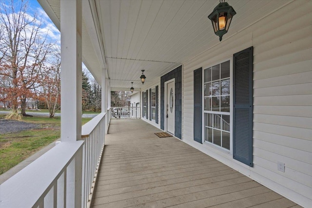 wooden terrace with covered porch