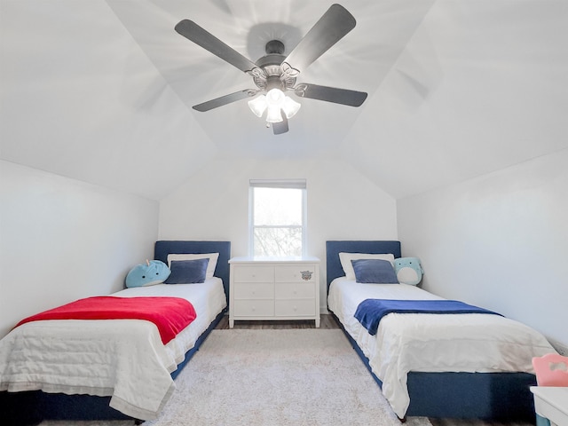 bedroom featuring lofted ceiling and a ceiling fan