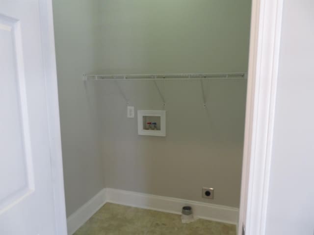 laundry room featuring laundry area, hookup for an electric dryer, baseboards, and washer hookup