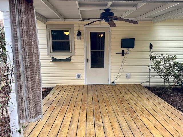 wooden terrace with ceiling fan