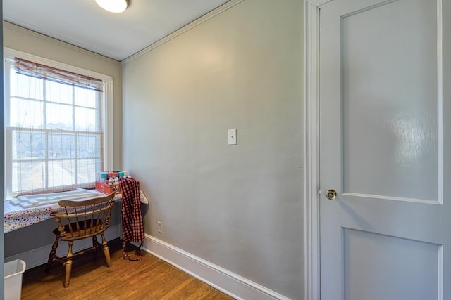 office area featuring baseboards and light wood-style floors