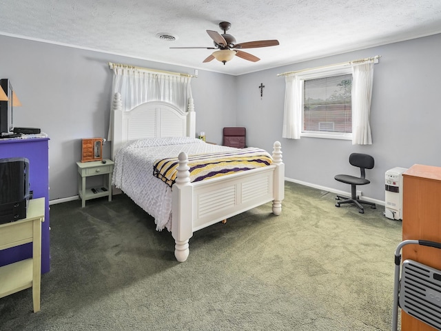 carpeted bedroom featuring visible vents, baseboards, a textured ceiling, and ceiling fan