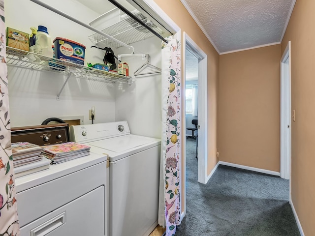 washroom featuring baseboards, carpet floors, laundry area, a textured ceiling, and independent washer and dryer