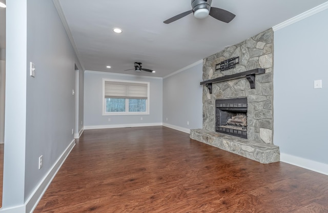 unfurnished living room featuring dark wood finished floors, ceiling fan, and ornamental molding