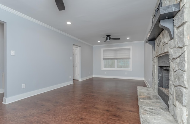 unfurnished living room with dark wood finished floors, a fireplace, crown molding, and a ceiling fan