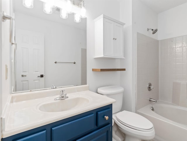 full bath featuring vanity, toilet, and washtub / shower combination