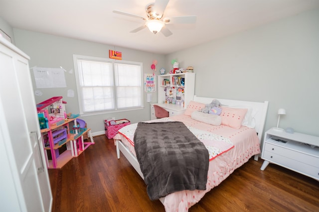 bedroom featuring ceiling fan and wood finished floors