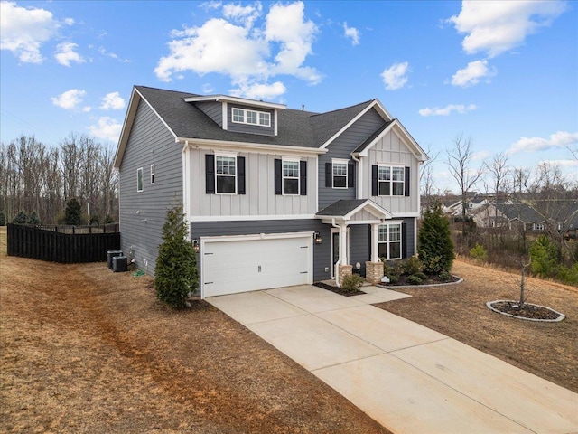 view of front of home with a garage, central air condition unit, board and batten siding, and concrete driveway