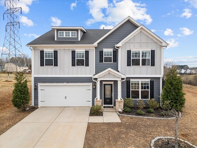 craftsman house with a garage, board and batten siding, and concrete driveway