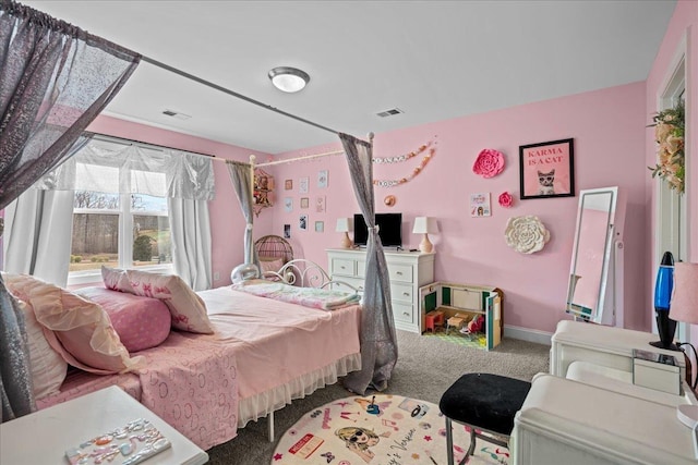 bedroom with baseboards, visible vents, and carpet floors