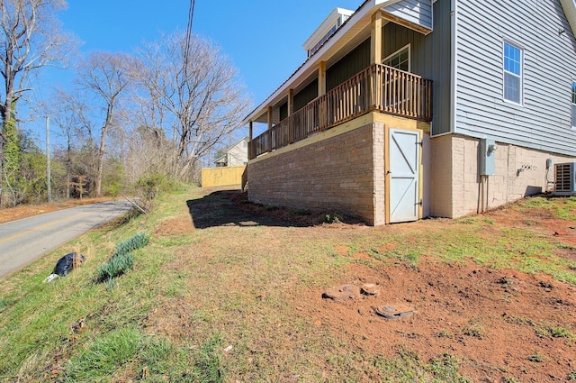 view of side of property featuring cooling unit