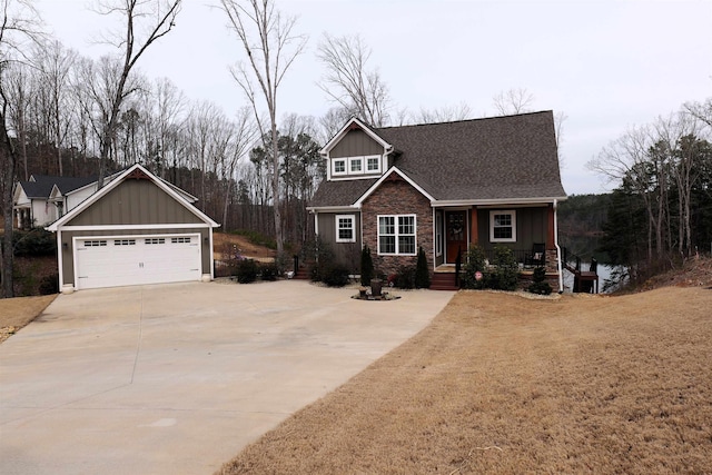 craftsman-style home with a garage, board and batten siding, concrete driveway, and a shingled roof