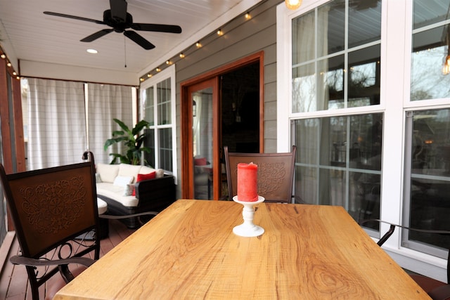 sunroom / solarium with ceiling fan