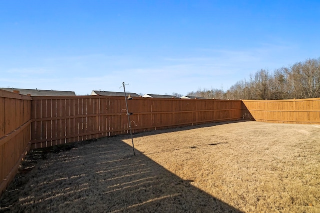 view of yard featuring a fenced backyard