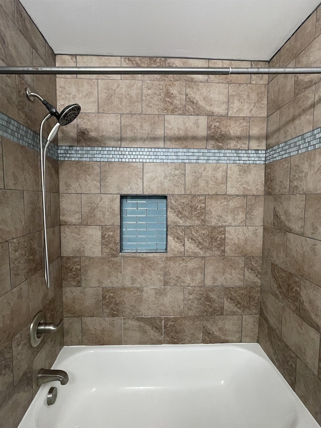 bathroom featuring shower / washtub combination