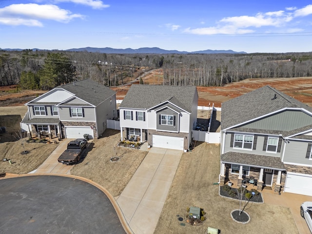 aerial view featuring a mountain view