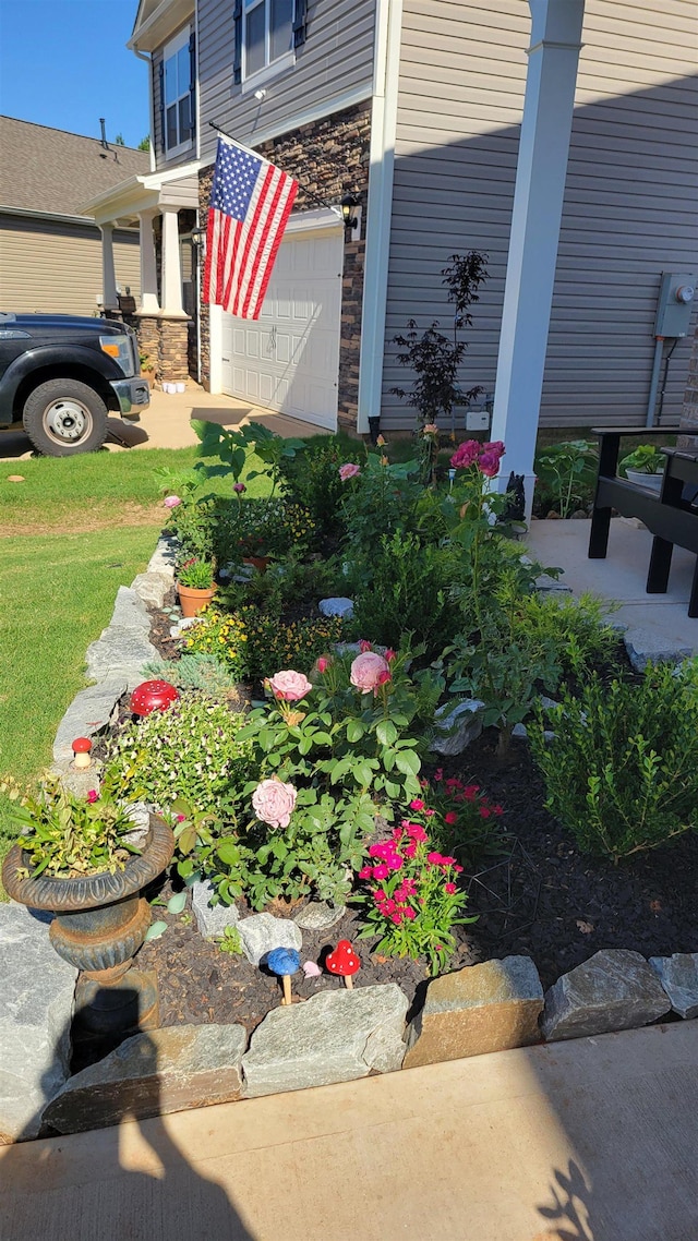 view of yard with a garage