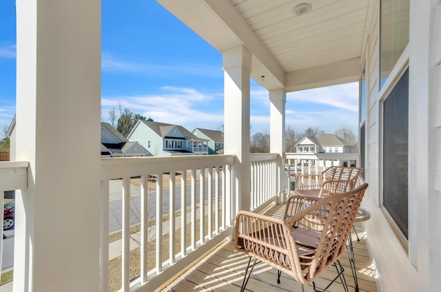 balcony featuring a residential view