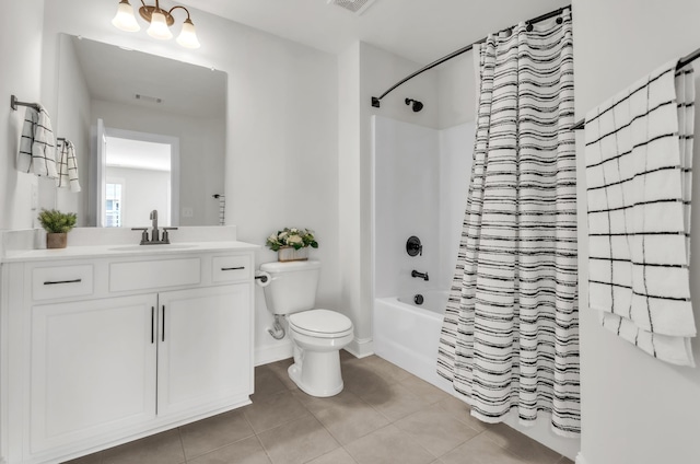 full bath featuring vanity, visible vents, tile patterned floors, toilet, and shower / tub combo with curtain