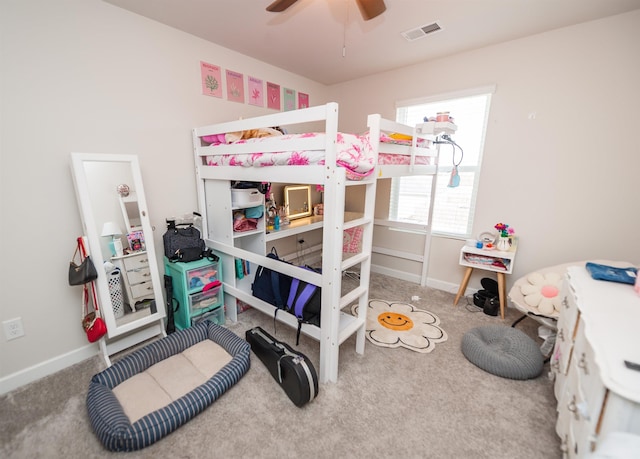 bedroom with visible vents, baseboards, a ceiling fan, and carpet flooring