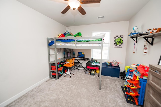 carpeted bedroom with baseboards and visible vents