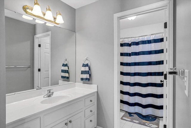 full bathroom featuring vanity and a shower with shower curtain