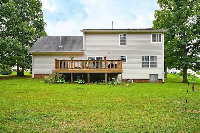 back of house with a deck, a lawn, and crawl space