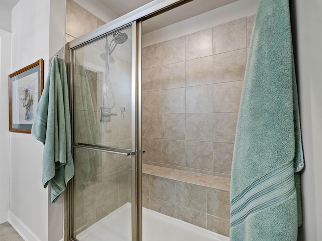 full bathroom with a stall shower