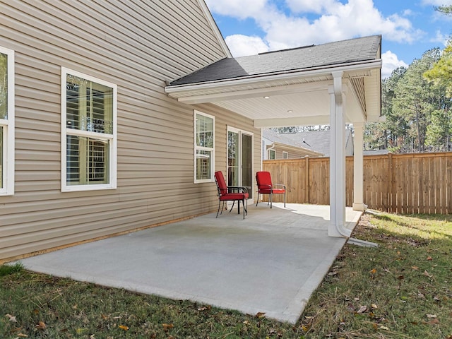 view of patio with fence