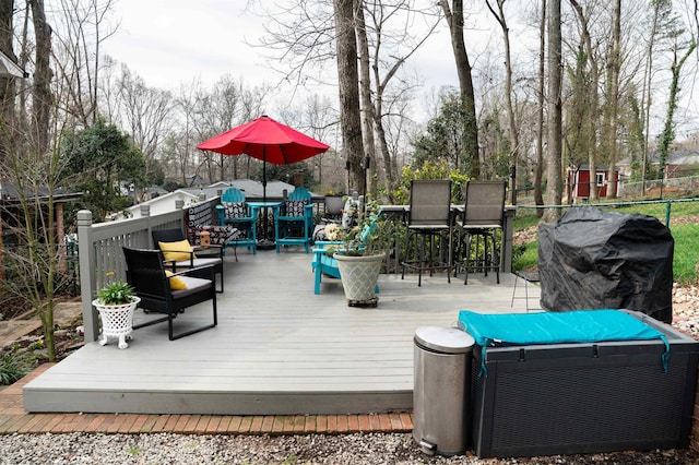 deck featuring fence and grilling area