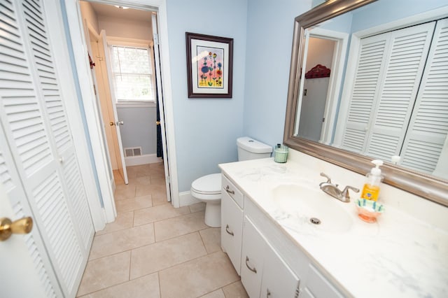 bathroom with visible vents, baseboards, a closet, tile patterned floors, and toilet