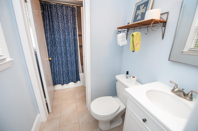 full bathroom with tile patterned flooring, toilet, vanity, and shower / bathtub combination with curtain