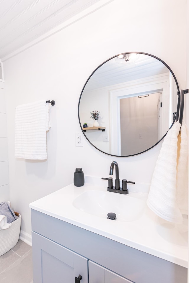 bathroom featuring tile patterned floors and vanity