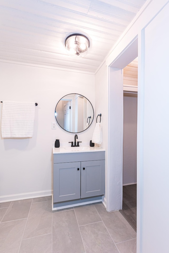 bathroom with vanity and tile patterned floors