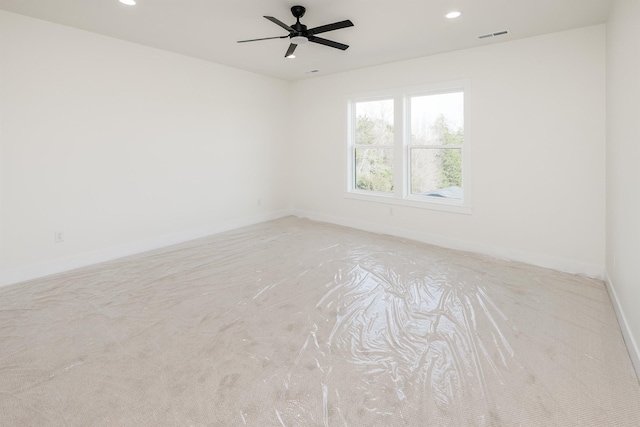unfurnished room with visible vents, recessed lighting, baseboards, and ceiling fan