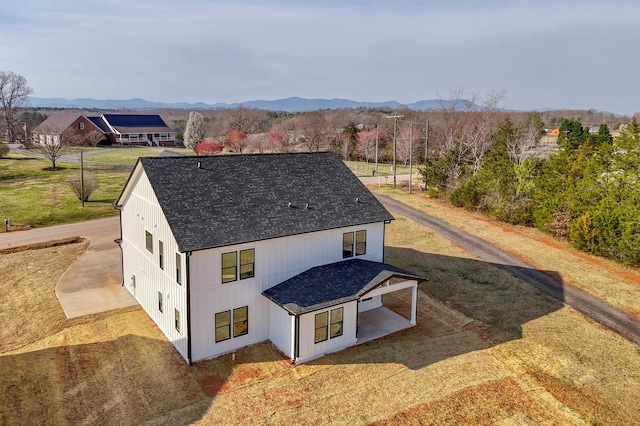 exterior space featuring a mountain view