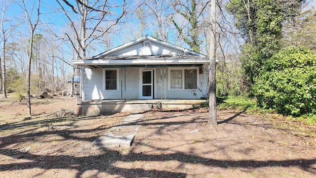 bungalow-style house featuring covered porch