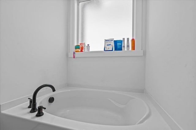 full bath with a bath