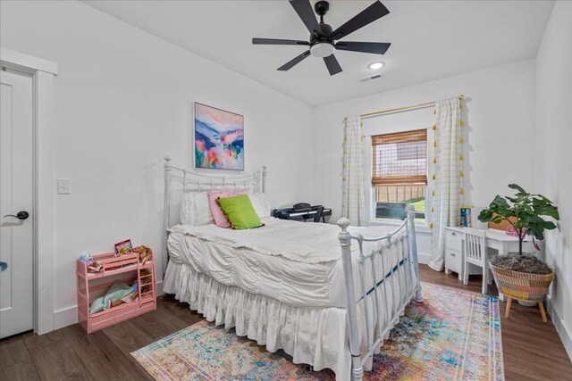 bedroom with visible vents, a ceiling fan, wood finished floors, recessed lighting, and baseboards