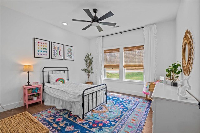 bedroom with visible vents, baseboards, recessed lighting, wood finished floors, and a ceiling fan