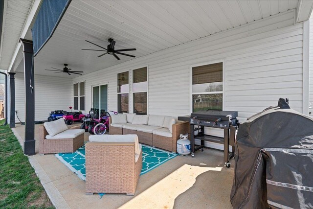 view of patio featuring an outdoor living space, a grill, and ceiling fan