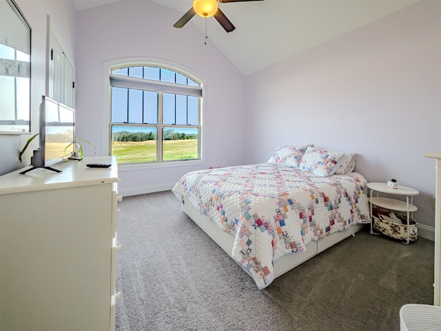 bedroom with baseboards, carpet floors, a ceiling fan, and vaulted ceiling