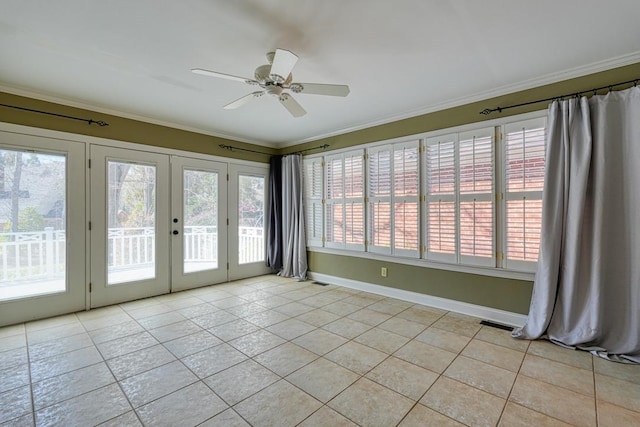 unfurnished room featuring visible vents, baseboards, a ceiling fan, and ornamental molding