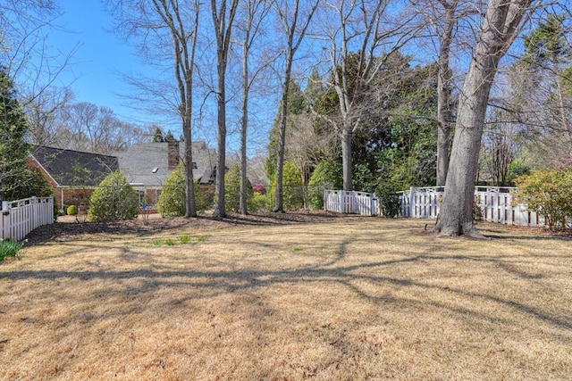 view of yard with fence