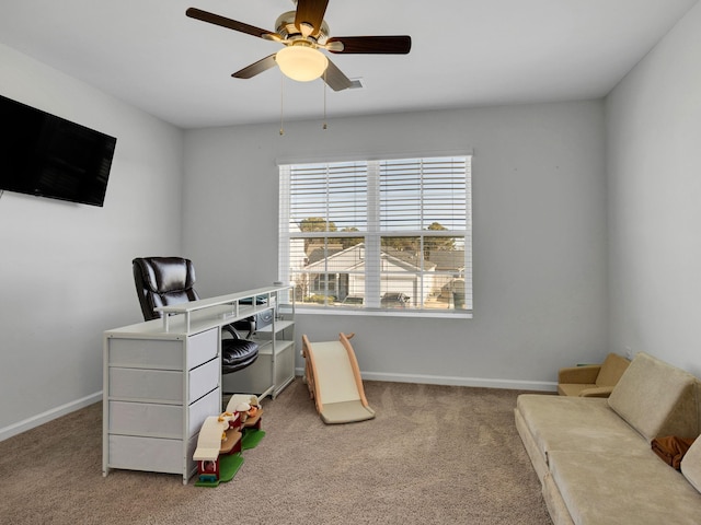 office with baseboards, ceiling fan, and carpet floors