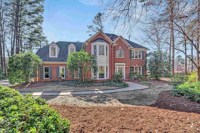 view of front of property featuring brick siding