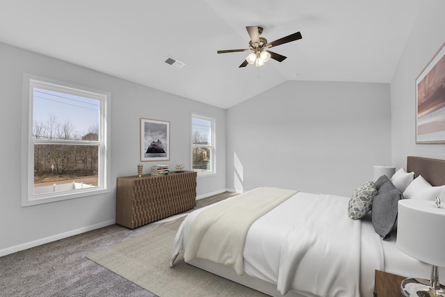 bedroom with carpet, baseboards, vaulted ceiling, and visible vents